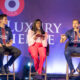Panelists discuss luxury experiences on stage