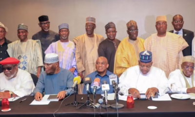 Group of men at a conference table