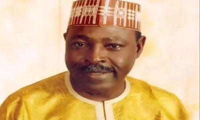 Man in traditional attire smiling